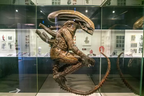 Original Alien film costume suspended in a museum