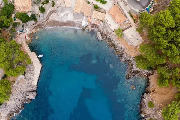 Overhead shot of the bay and village of Sa Calobra, Majorca, with its small port and transparent waters