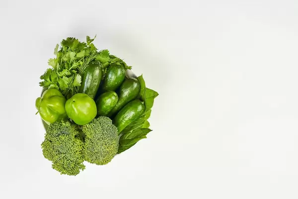 Overhead view of a bowl with organic vegetables