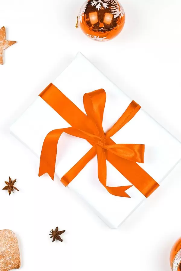 Overhead view of Christmas gift and ornaments