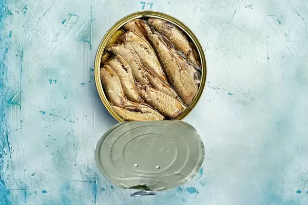 Overhead view of smoked sprats in can