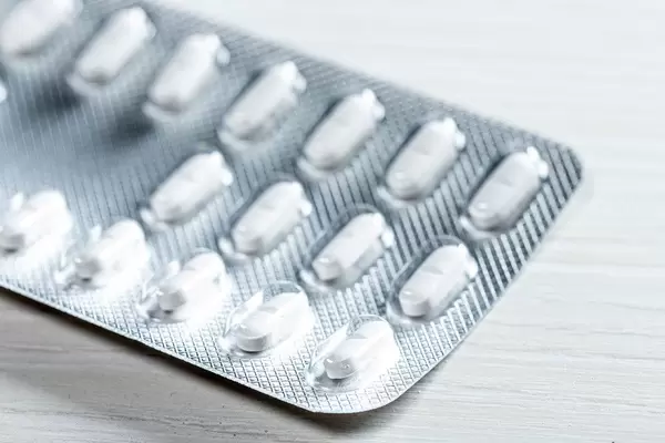 Pack of pills on the table. The concept of medical care (Flip 2019)