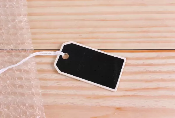 Package label on wooden table