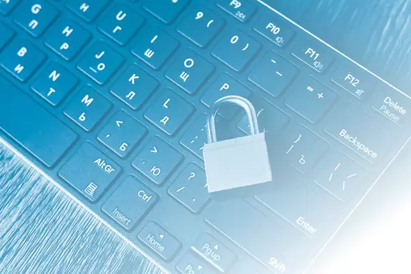 Padlock with computer keyboard. Internet and computer security