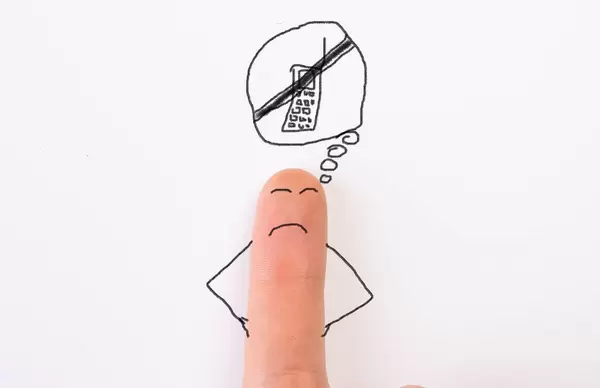 Painted happy finger is angry because he can't use his mobile phone