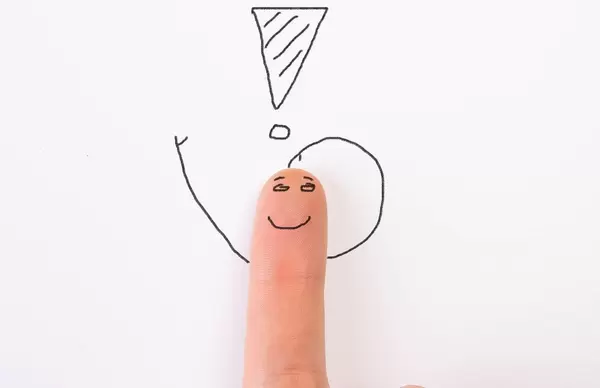 Painted happy finger with exclamation mark