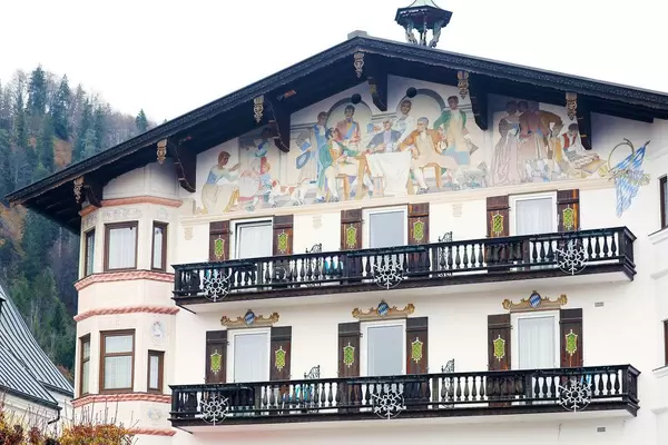 Painted house in Reit im Winkl, Germany. House with balconies