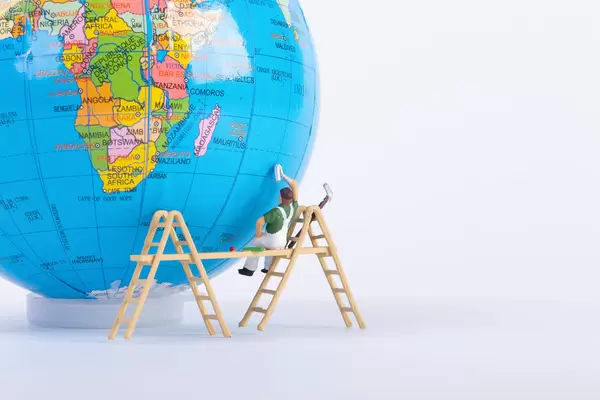 Painter with the Earth on a white background