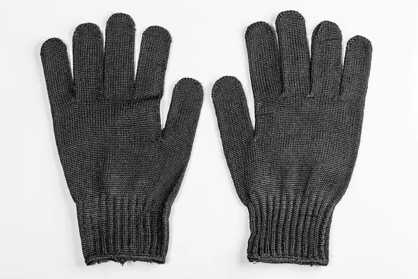 Pair of black work gloves on white background (Flip 2019)