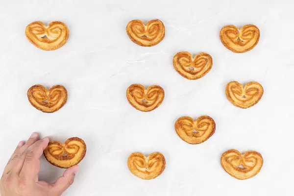 Palmeritas Puff Pastry arranged on the grey marble table