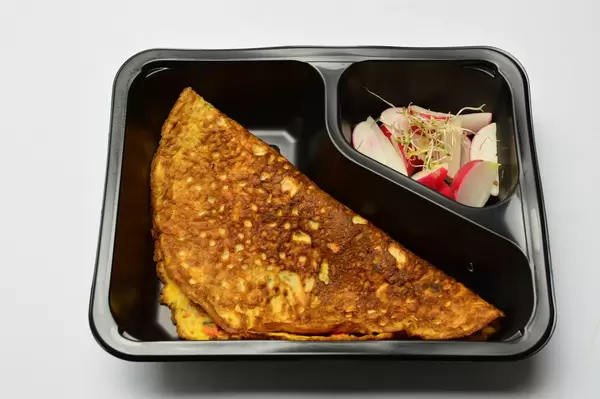 Pancake with radish and sprouts