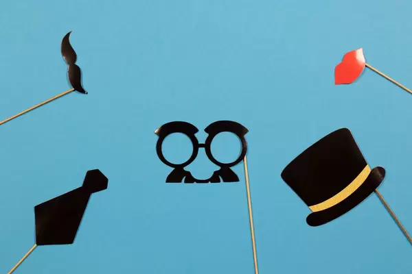 Paper accessories on a stick for a photo shoot on holidays or parties