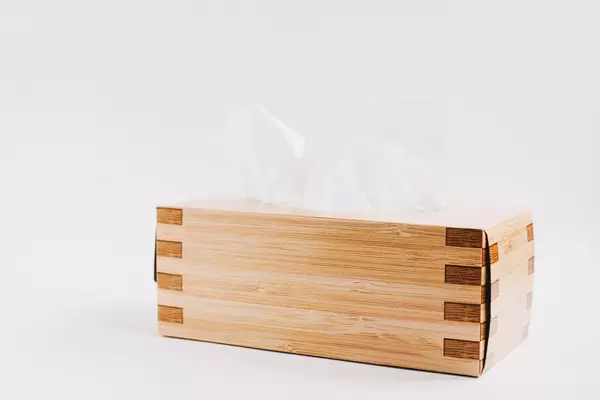 Paper tissue box on white background