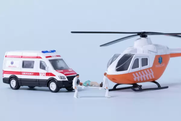 Paramedic Ambulance team taking care of patient