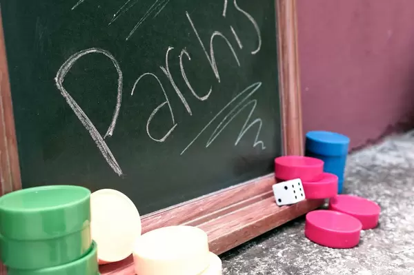 Parchís written on chalkboard