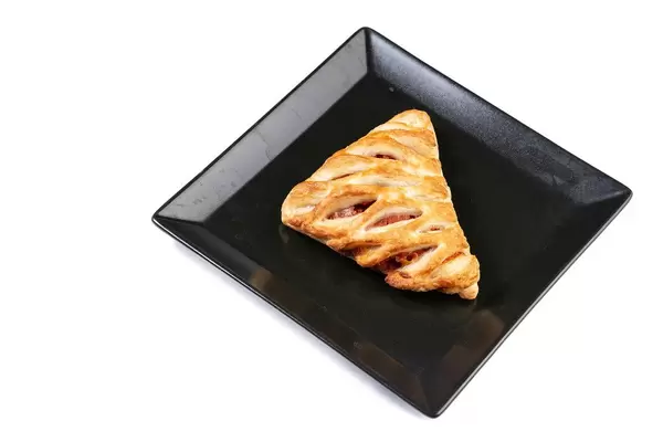 Patry with Pizza Stuffing on the black plate