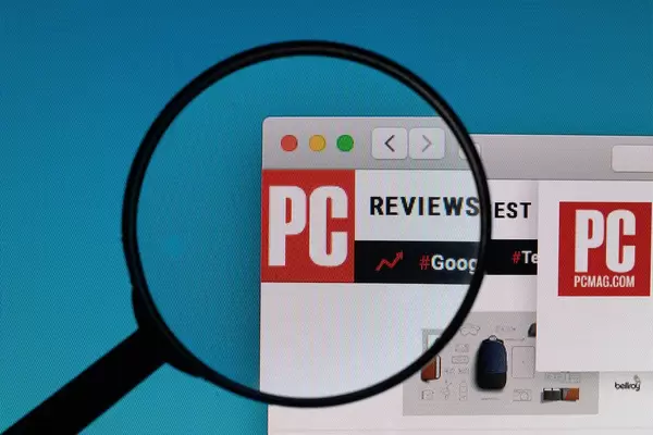 PCMag.com logo under magnifying glass