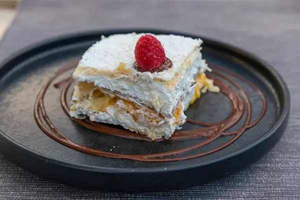 Peach & cream mille feuille with chocolate sauce: French dessert at Villa vegana in Selva, Mallorca