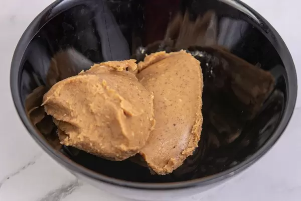 Peanuts Butter in the black bowl