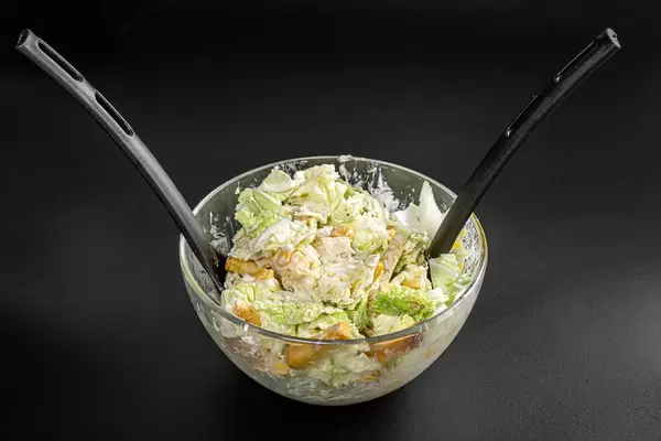 Peking cabbage salad on dark background
