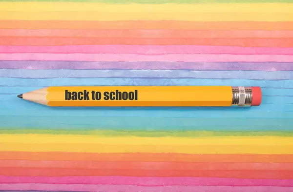 Pen with Back to School text on colorful background