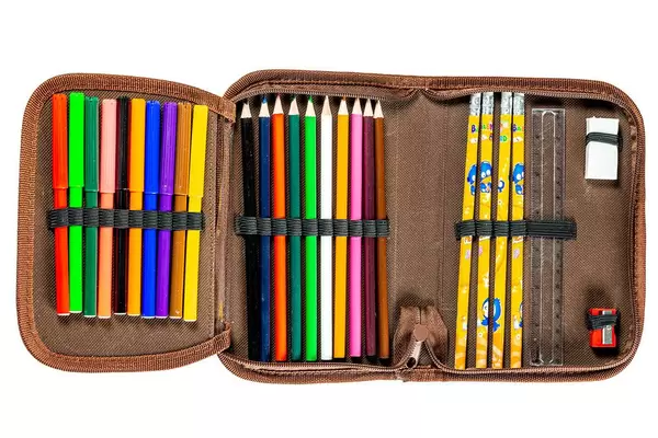Pencil case full of colored pencils, markers, ruler, eraser and sharpener