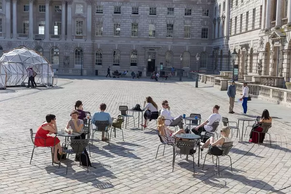 People enjoying a sunny day at Somerset House