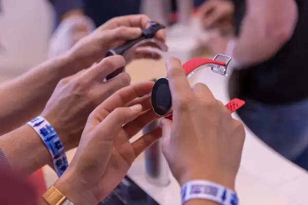 People handling Polar Vantage Multisport GPS Watches