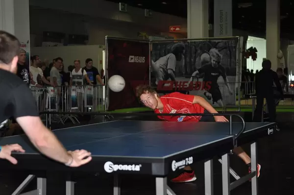 People playing the Sports Headis with People watching