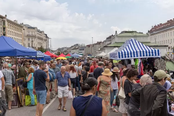 People shopping at the Naschmark flea market in Vienna