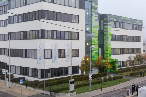 People walking around the Headquarters of BioNTech Company in Mainz, Germany
