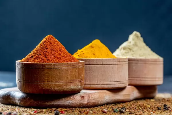 Pepper, Curcuma and ginger on the kitchen Board