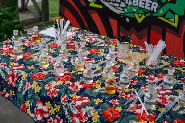 Perfume Blending Station with many different Glasses with Frangrances, Pipettes and other Utensils at a Weekend Market