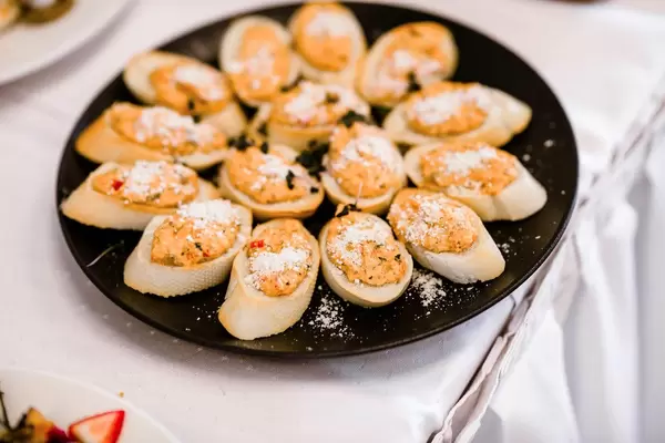Pesto Parmesan Bruschettas Serve On The Black Dish