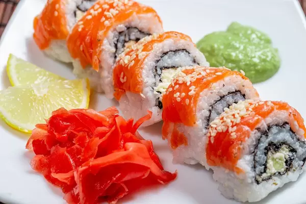 Philadelphia sushi homemade with wasabi, ginger and lemon slices (Flip 2019)