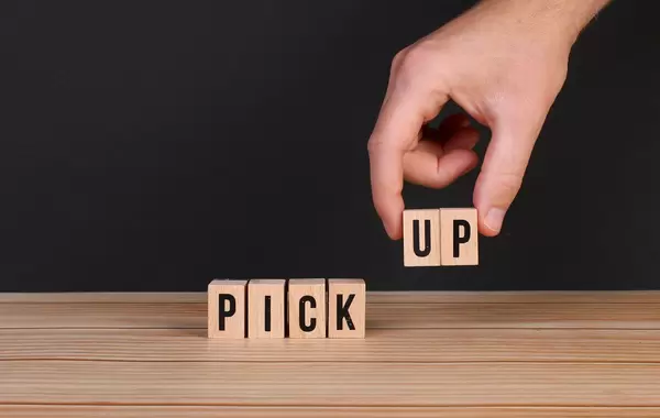 Pick Up word written on wooden blocks