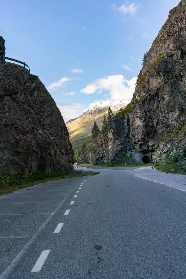 Picturesque weaving road between Swiss cliffs
