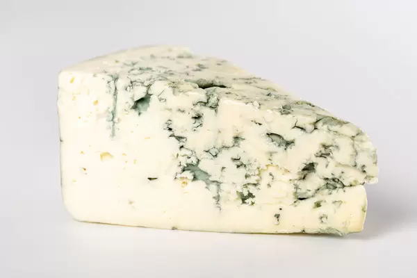 Piece cheese with blue mold