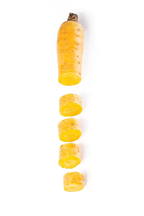 Pieces of bright fresh yellow carrot