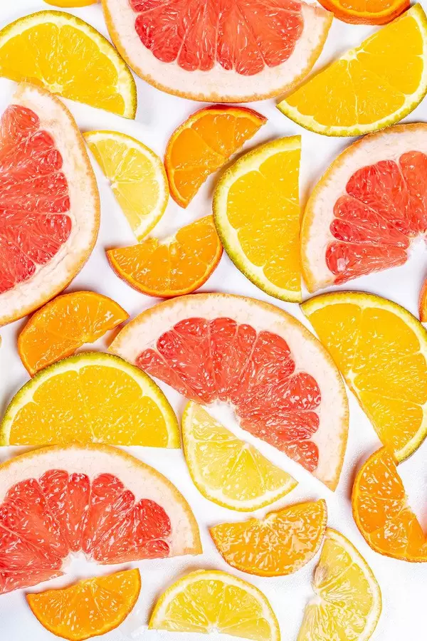 Pieces of colorful citrus fruit. Concept of healthy food, natural vitamins (Flip 2020)