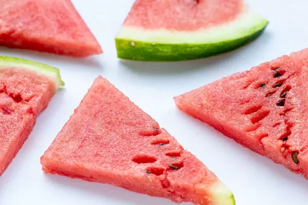 Pieces of fresh juicy watermelon on white background (Flip 2019) (Flip 2019)