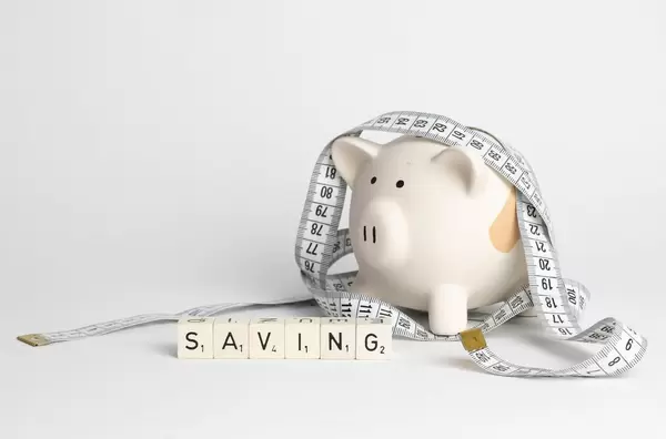 Piggy bank with measure tape