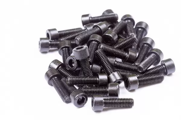 Pile of Imbus Screws above white background