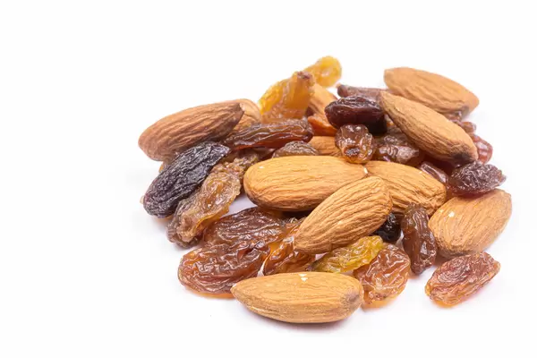 Pile of Raisins with Almonds above white background