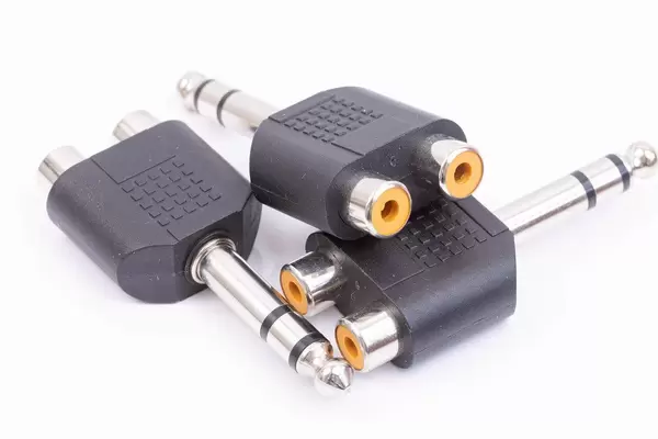 Pile of RCA converters adapters to 1/4 stereo jacks