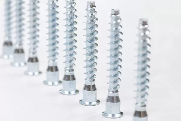 Pile of Screws for Wood with Hex thread on the table