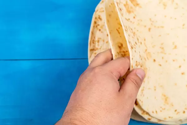 Pile of Tortillas in the hand
