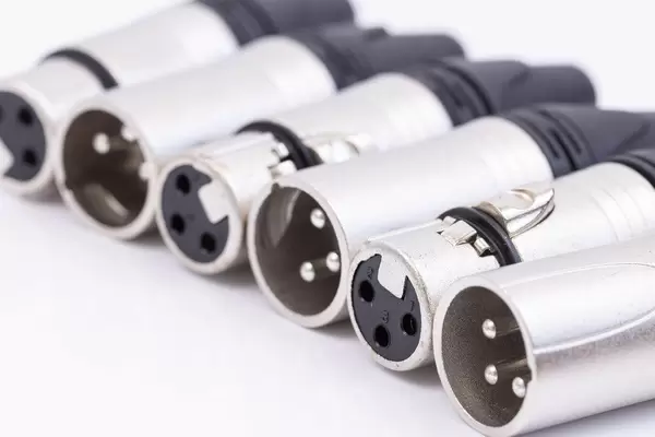 Pile of XLR Audio Connectors for microphone cables