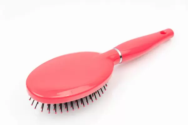 Pink-Comb-Brush-for-girls-isolated-above-white-background.jpg