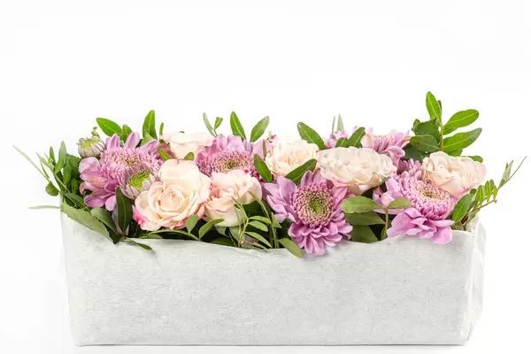 Pink eustoma and purple chrysanthemum flowers